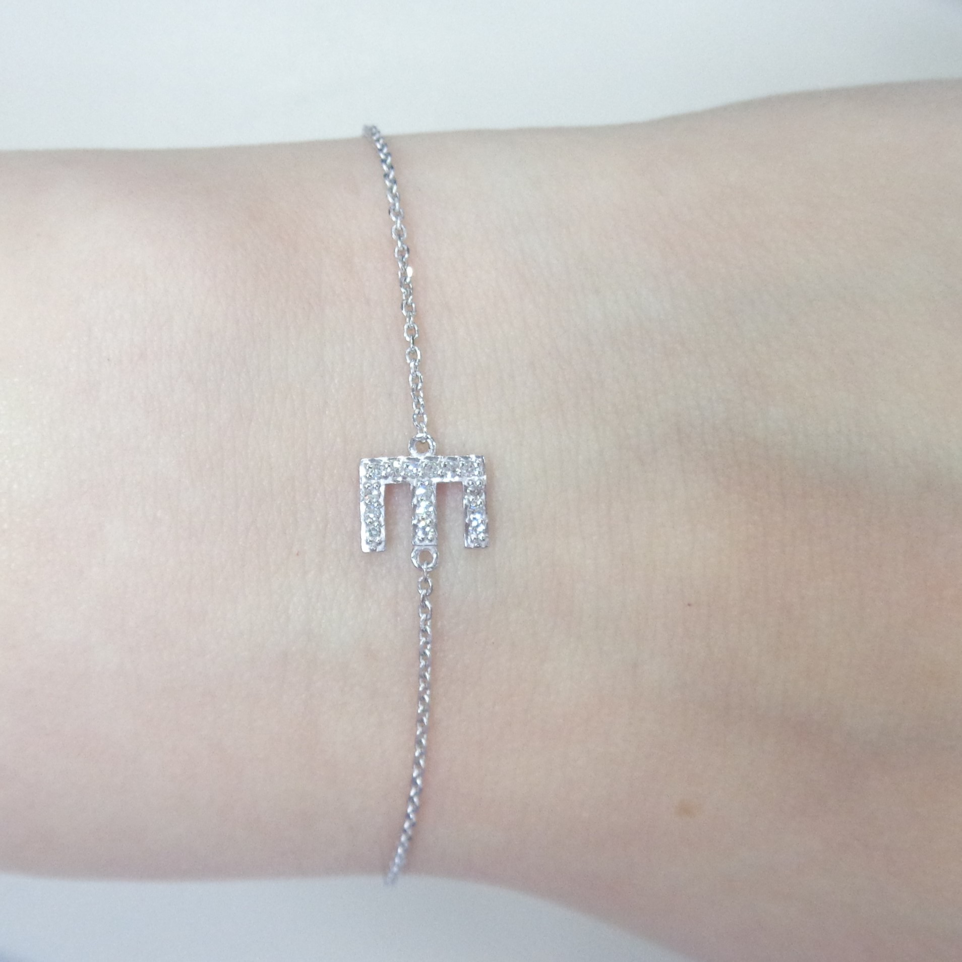 Браслет из белого золота с бриллиантами "Е"